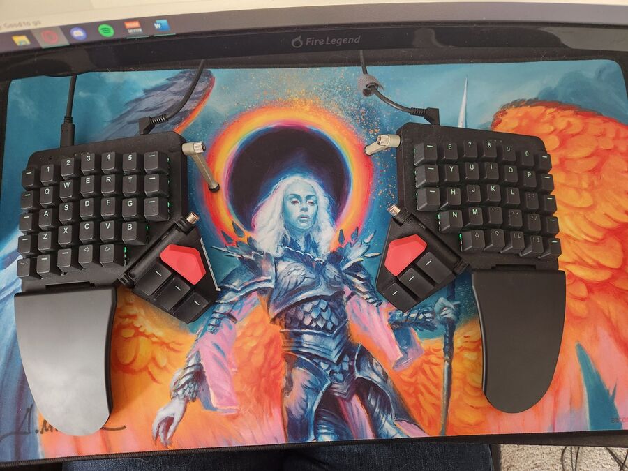 Adam Ranjo's keyboard with desk mat
