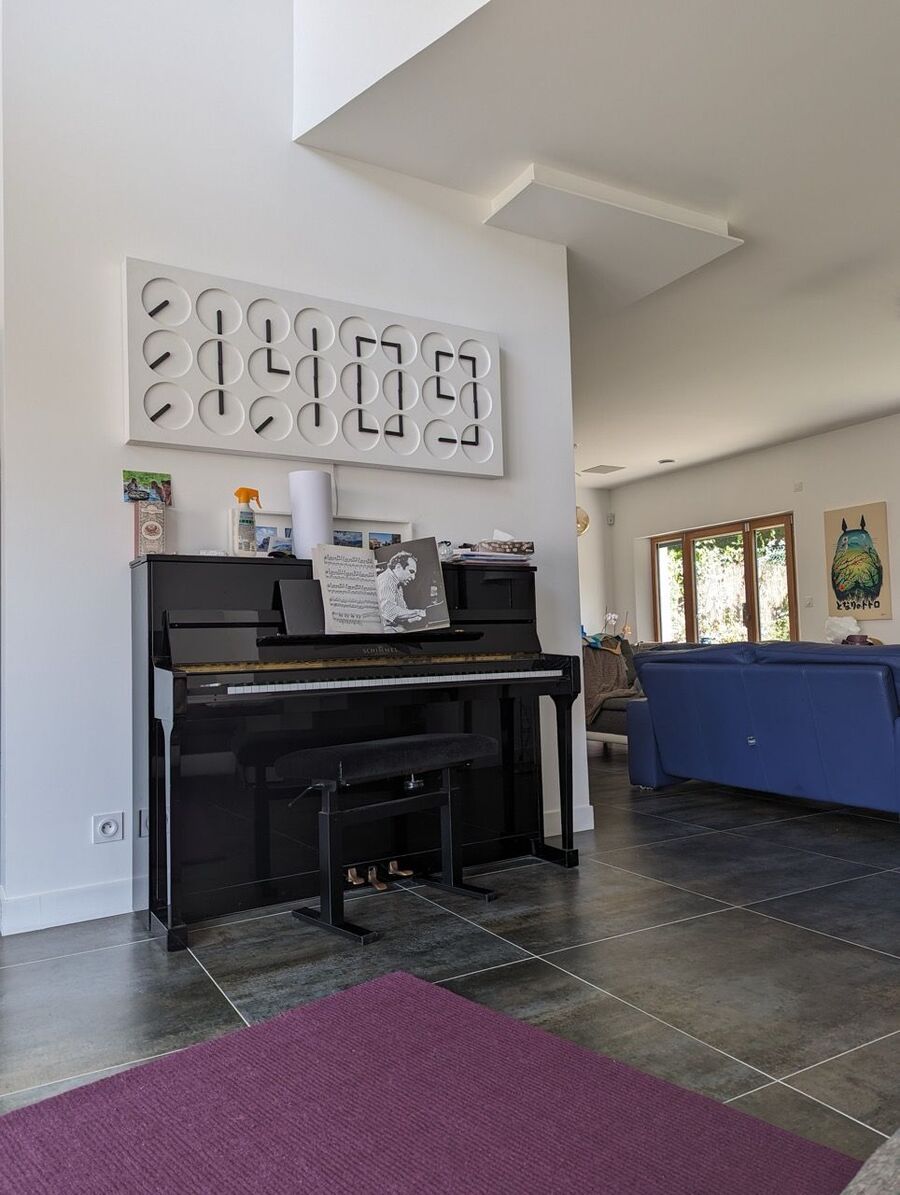 Bertrand Fournier's clock over piano