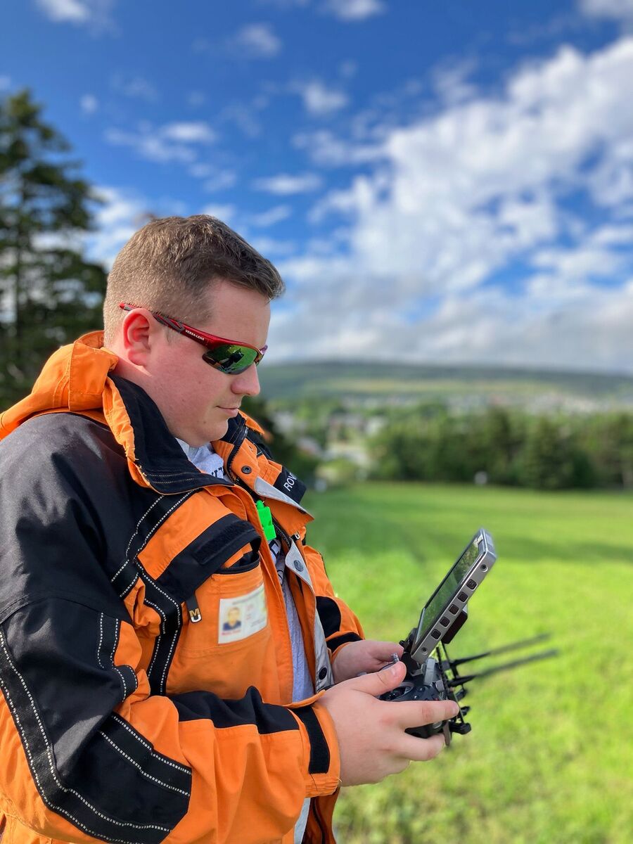 David Burke flying a drone