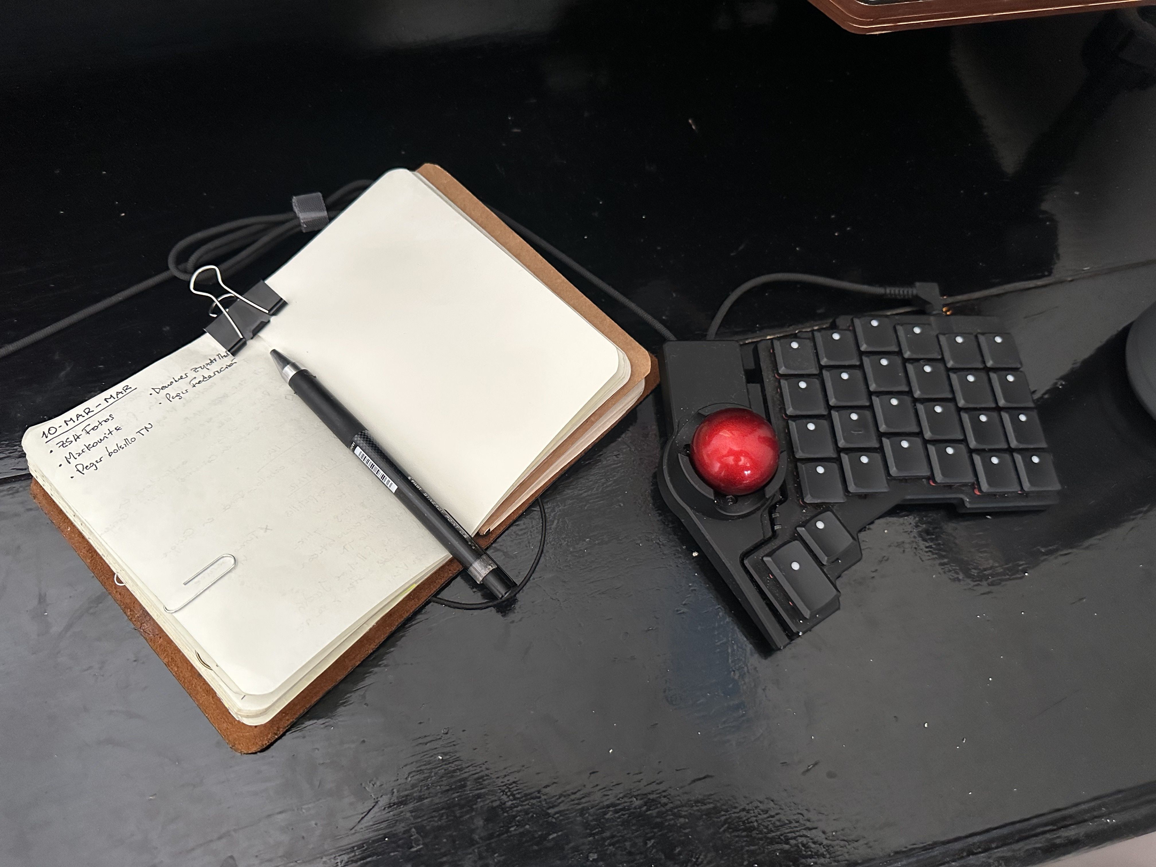 Eric Luna's notebook and half of his keyboard
