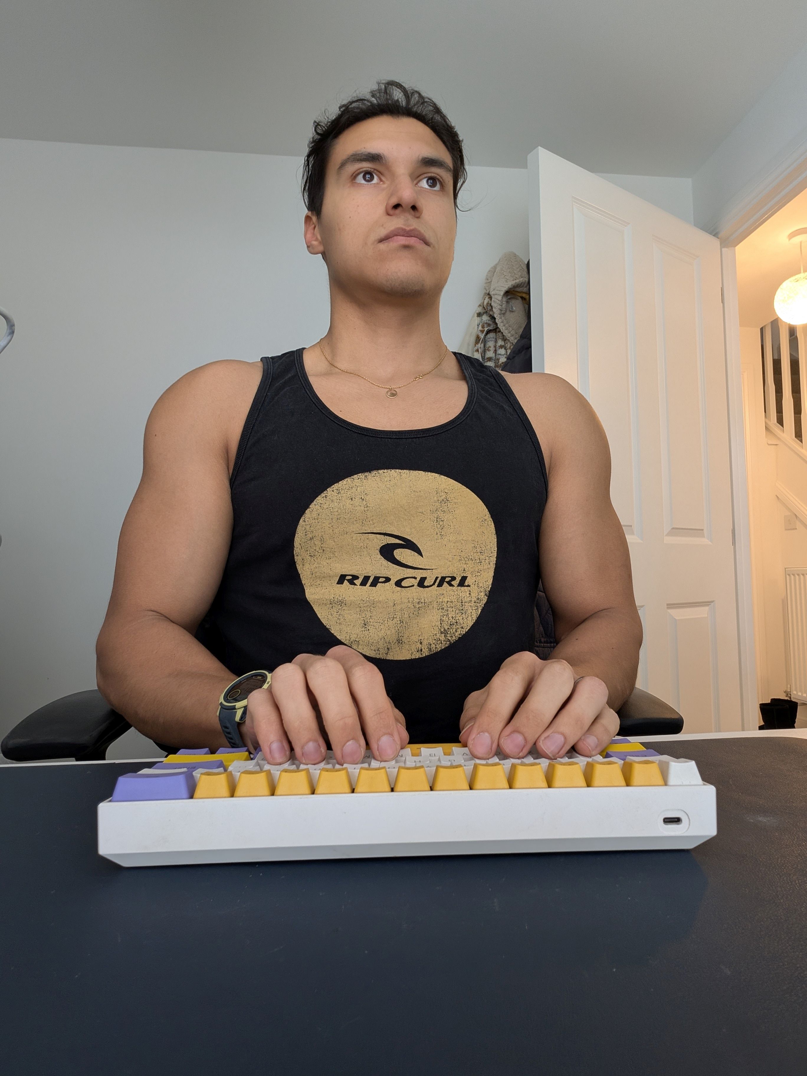 Matthew Castrillon-Madrigal at baseline, with a regular keyboard