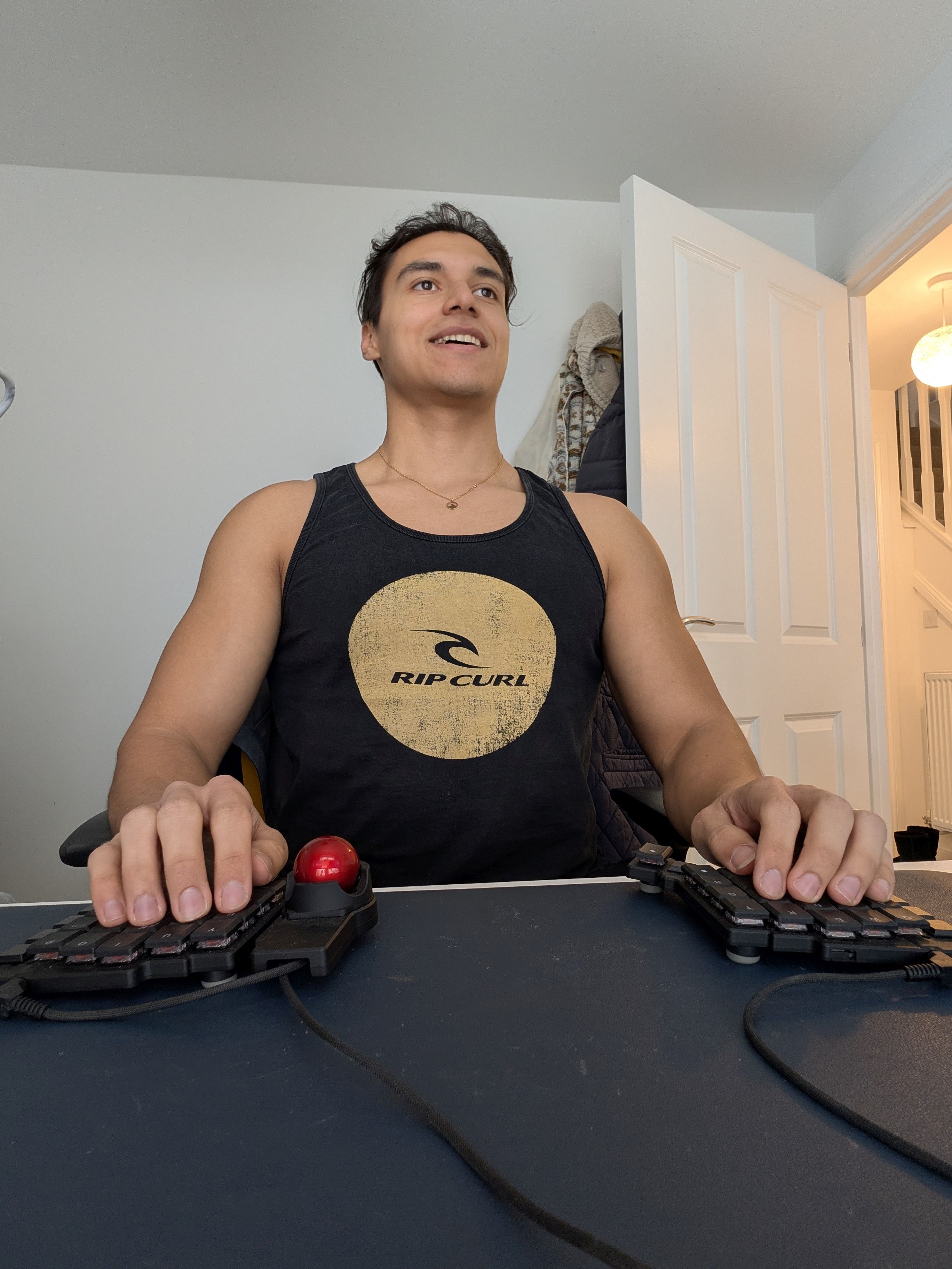 Matthew Castrillon-Madrigal relaxed and smiling, with his Voyager. Thanks, Matthew! This makes us happy, too!