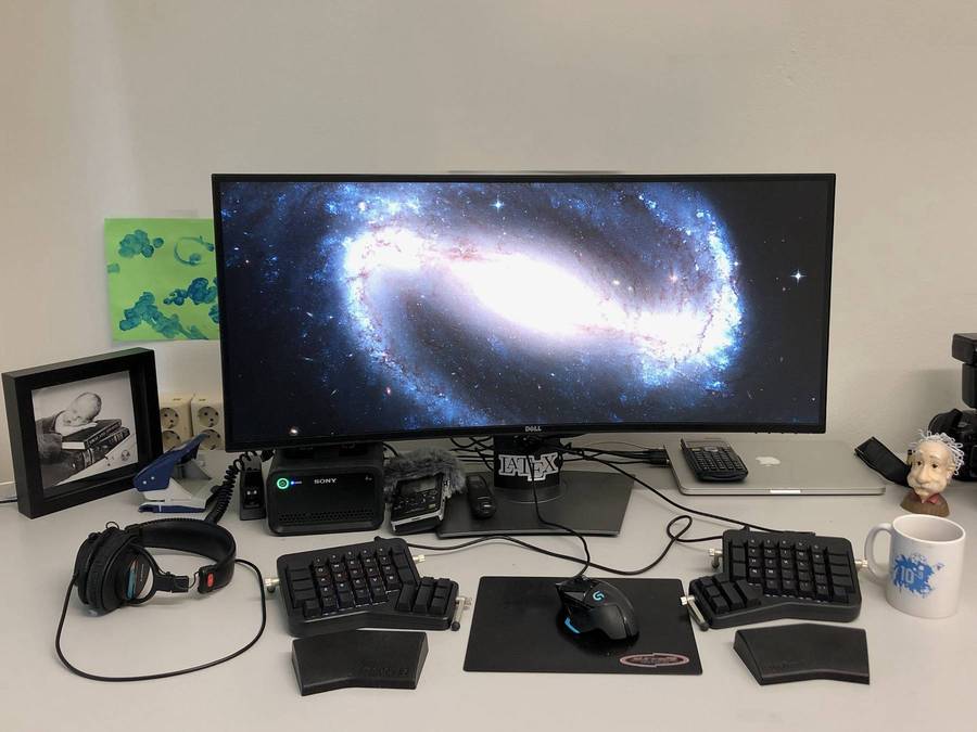 An Albert Einstein statue watches over Vegar's work setup