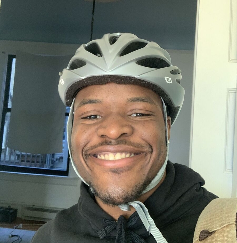 Pelumi Fafowora in a cycling helmet