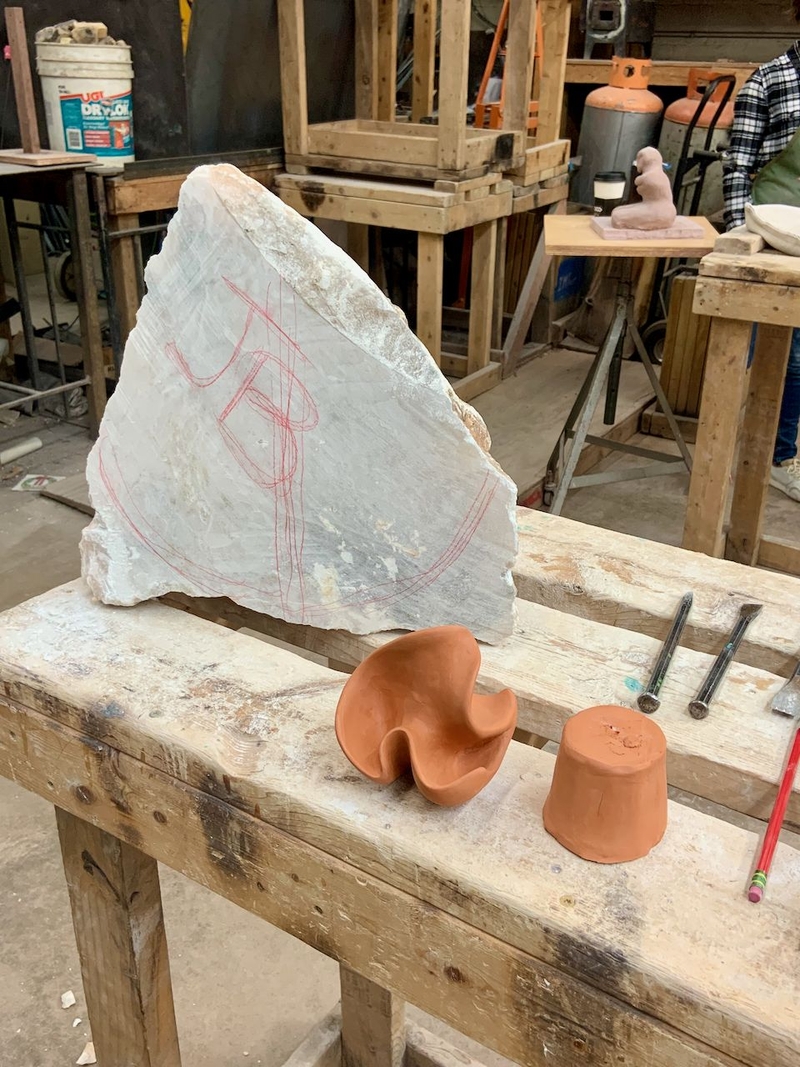 Jesse Bailey's clay mockup and block of stone