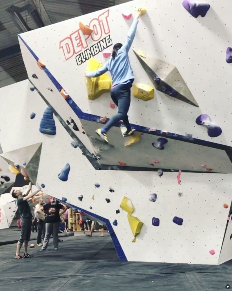 Alexia Chau on a climbing wall