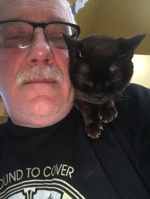 Pat Plummer with feline companion