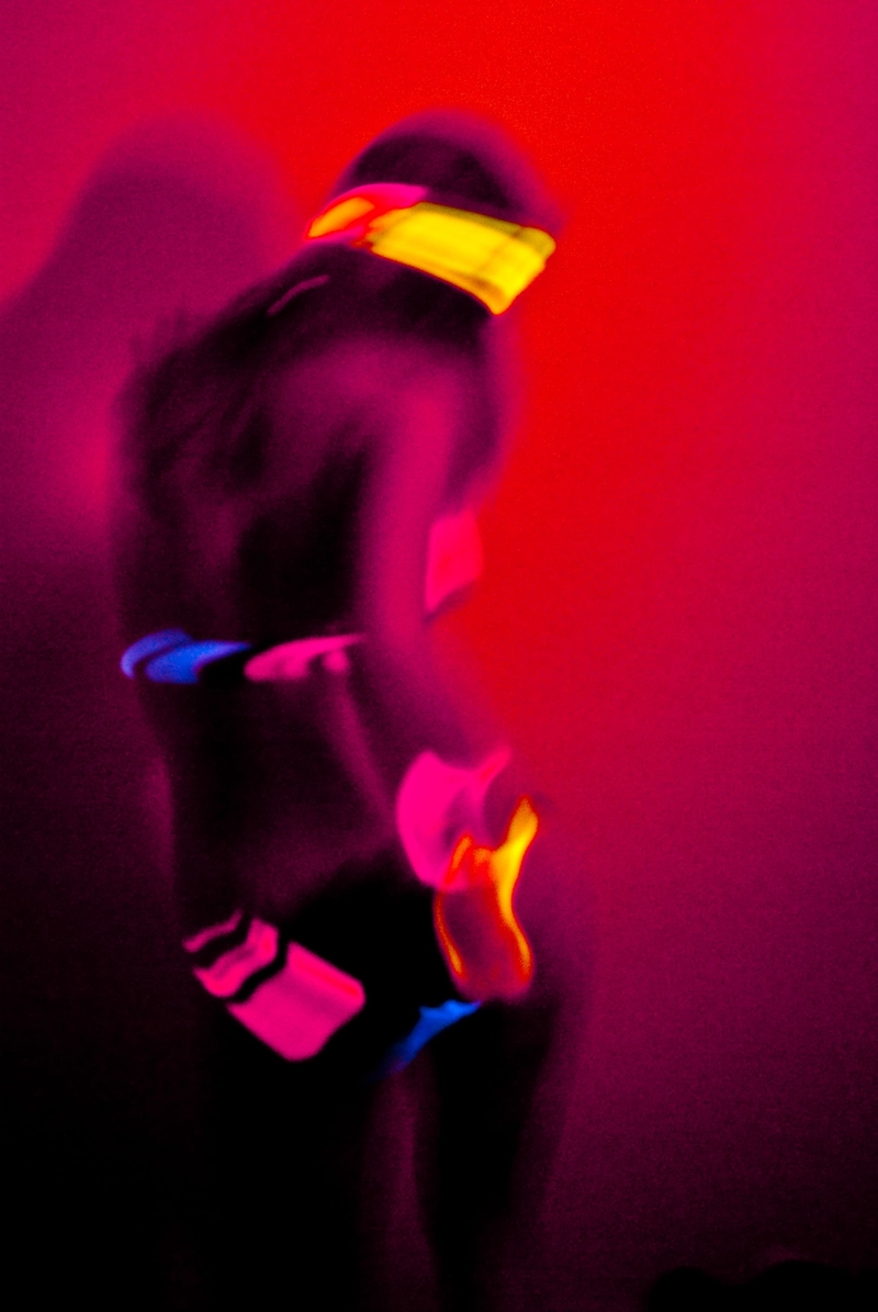 Ahmet Necati Uzer's photo of a person—a raver, perhaps?—glowing under red light