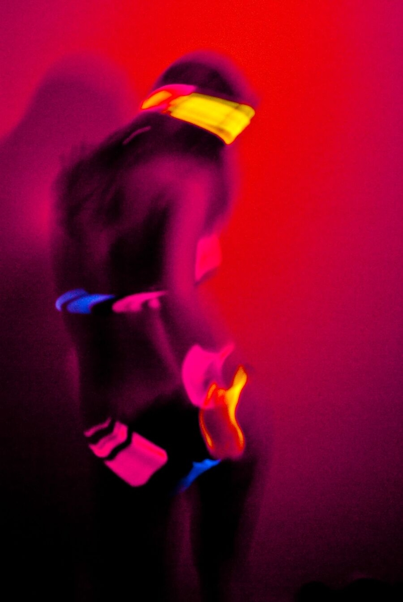 Ahmet Necati Uzer's photo of a person—a raver, perhaps?—glowing under red light