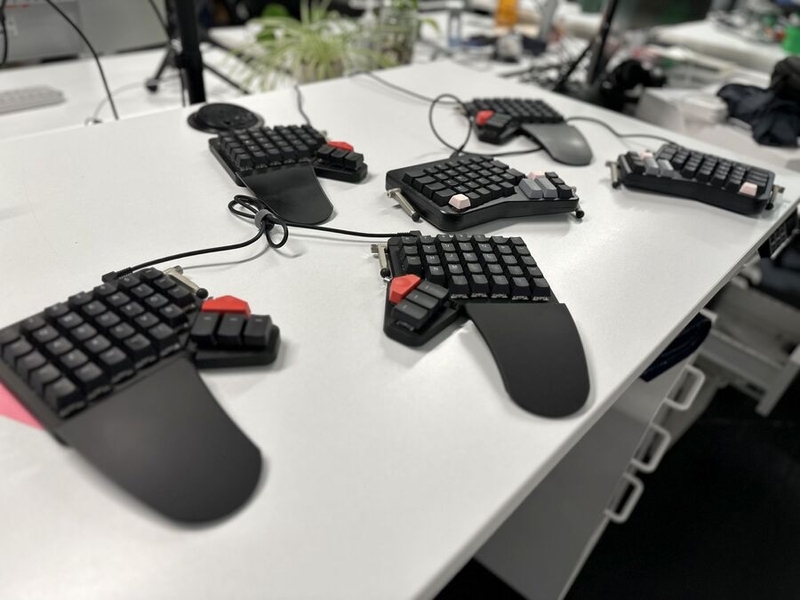 Angie Chiraz's work keyboard hanging out with other keyboards at work