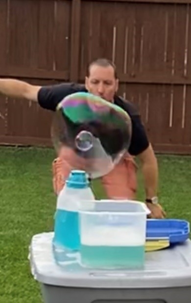 Tobias Brace making bubbles