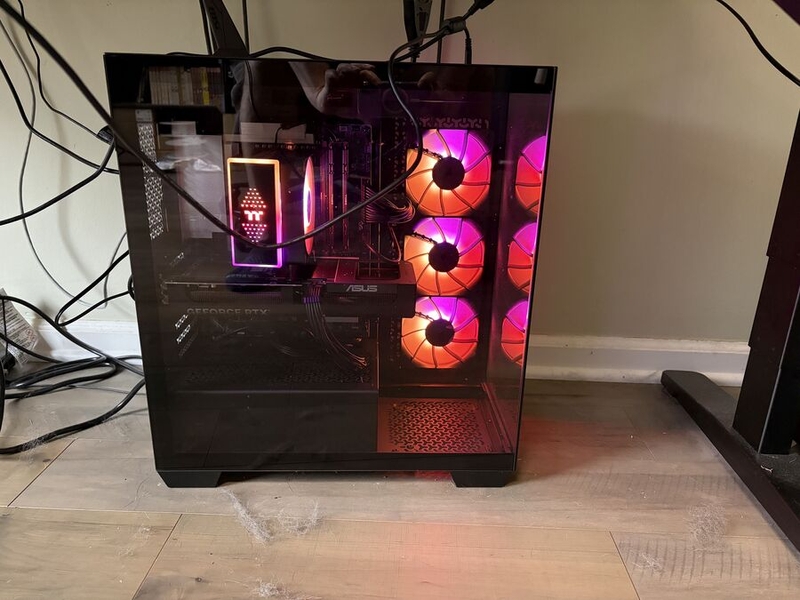 DJ's PC has cooling fans lit in warm colors DJ Picard's custom-built PC