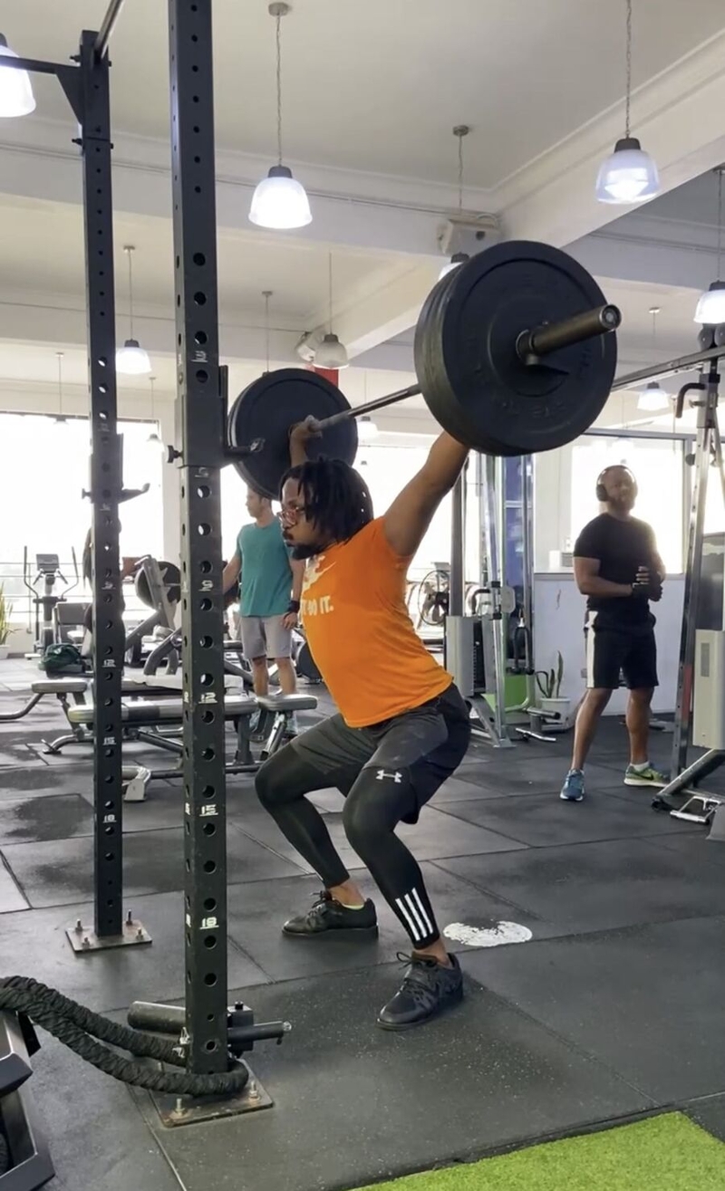 Douglas Mamilor lifting weights