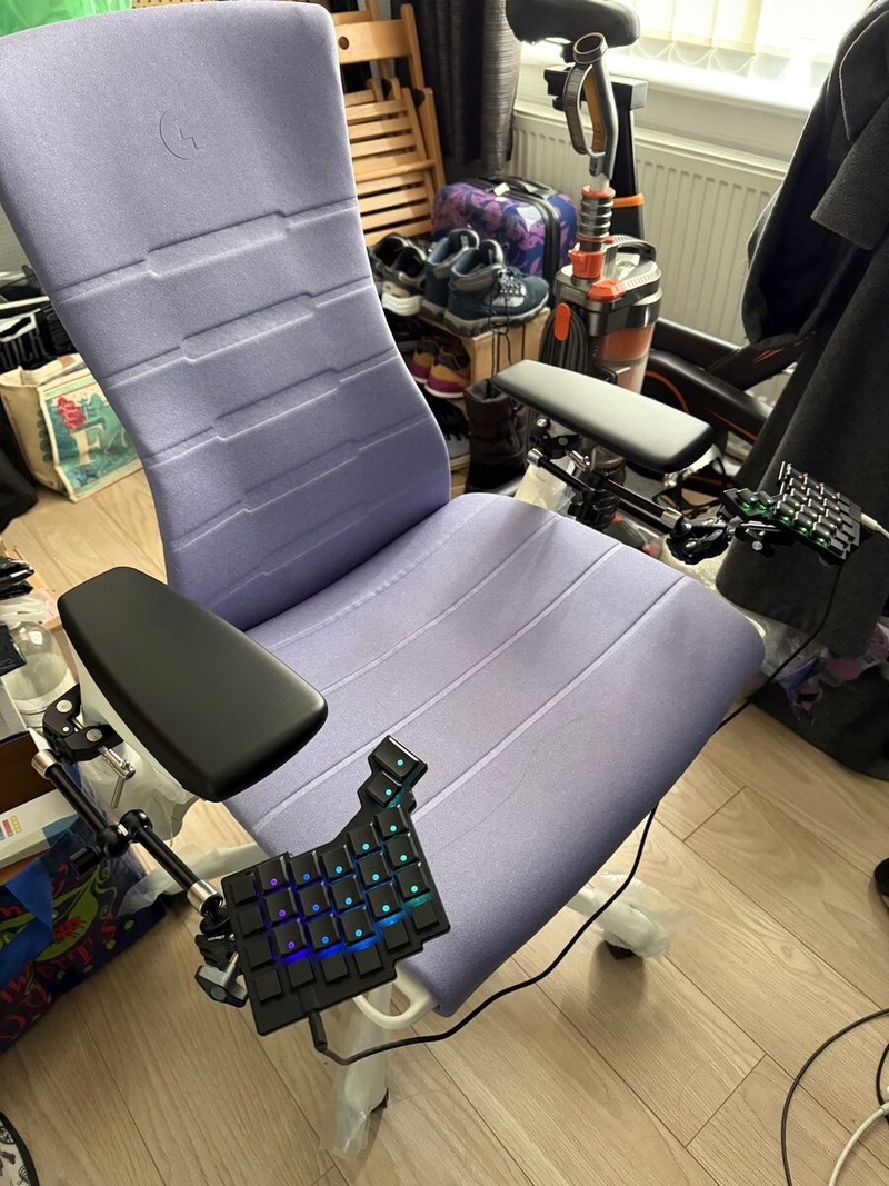 Alexia Chau's keyboard mounted on armrests