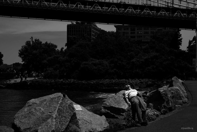 Juan Castillo's photo of a person sunning themself on rocks