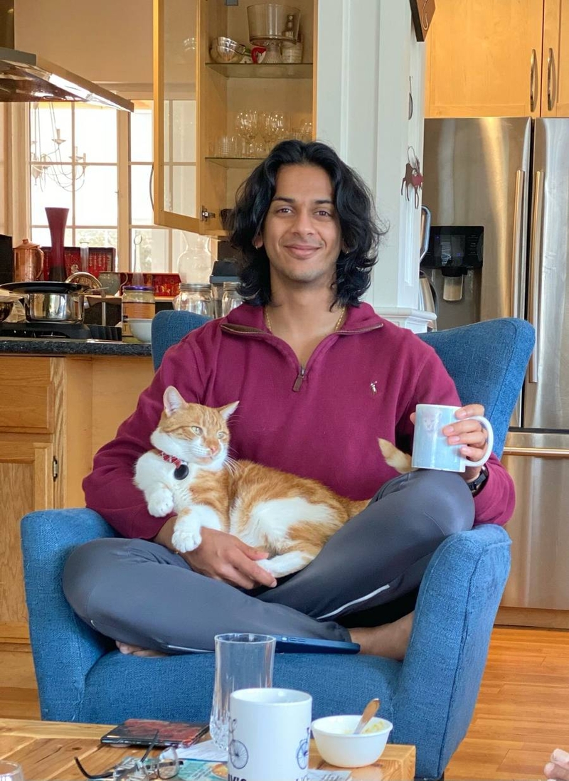 Samir Akre and his cat, Noodle