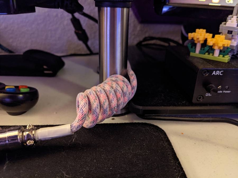 Rachel Vancleave's coiled USB cable at leg of monitor stand