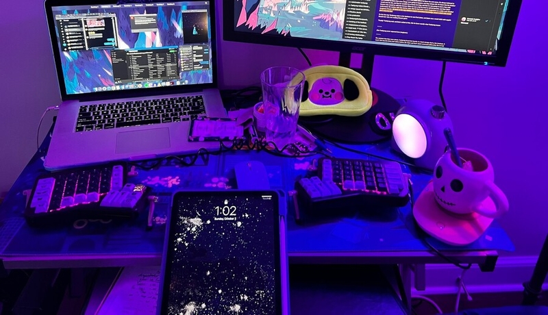 Nicole Nolan's desk with mug and phone