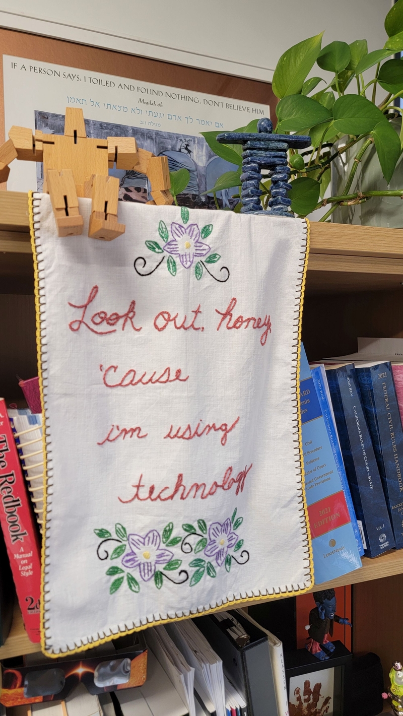Patrick Emerson McCormick's embroidered banner that says Look out, honey—I'm using technology