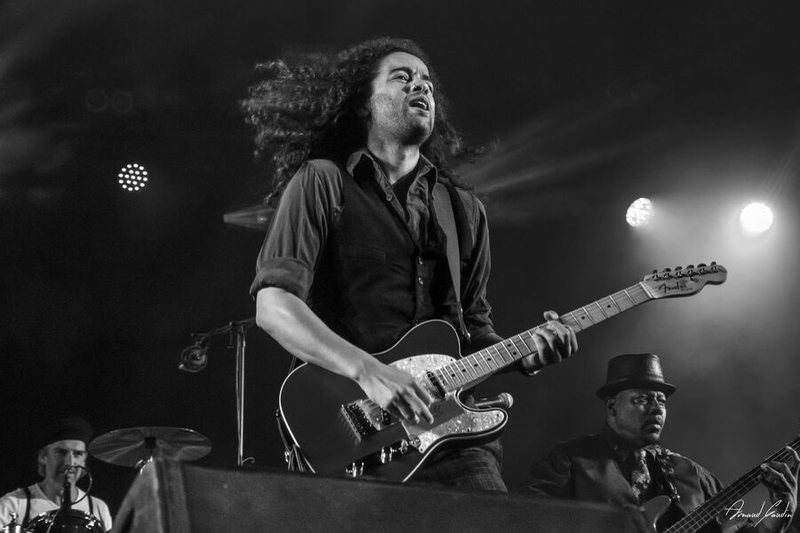 Lorne Ashley with a guitar